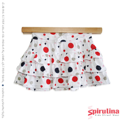 חצאית שכבות לבנה מנוקדת לילדות. נייבי-אדום במידות 4-12